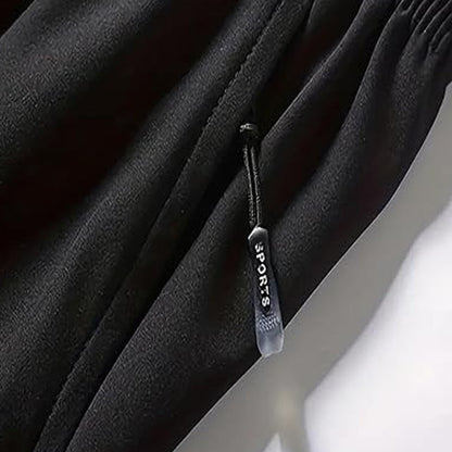Sneldrogende sportshort voor heren met zakken met ritssluiting