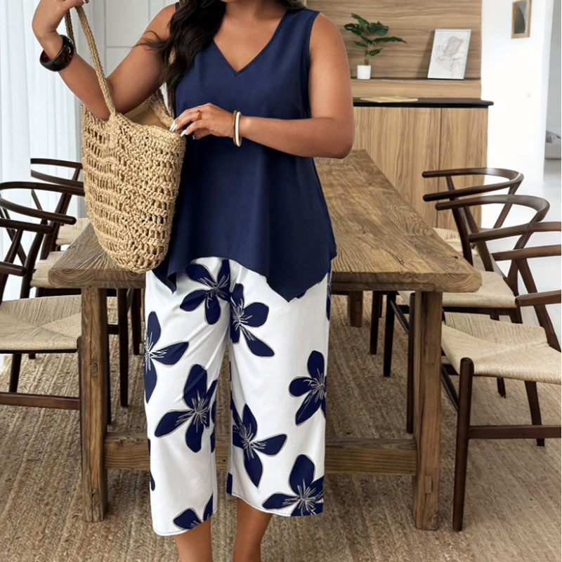 🌸 50% OFF! ✨ Women's Asymmetrical Top & Floral Print Capri Pants Set – Versatile, Vibrant, Comfortable 🌺